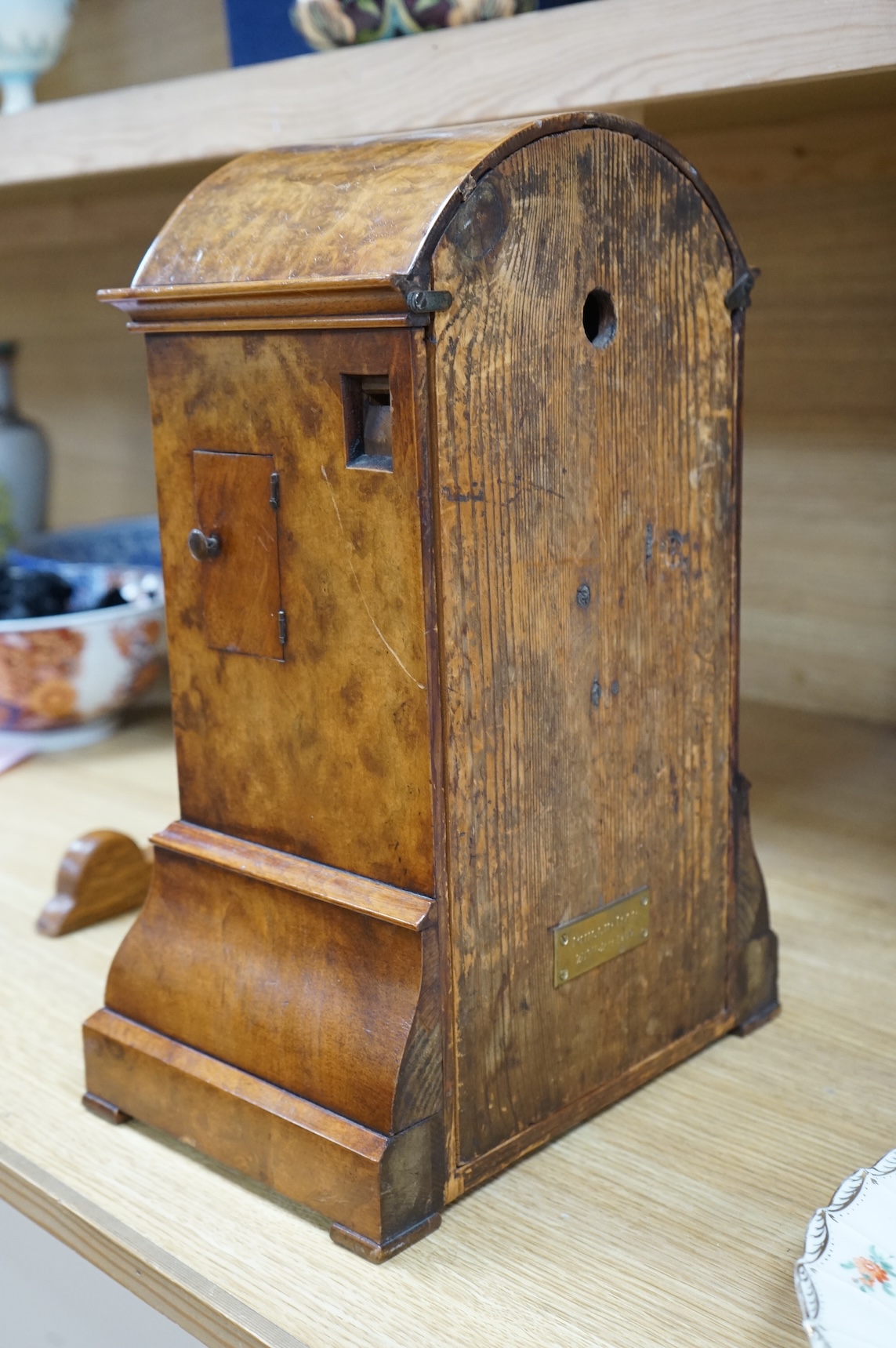 A Victorian burr walnut and marquetry dome topped cuckoo clock, signed Mitchell, London, with oak bracket, 41cm high